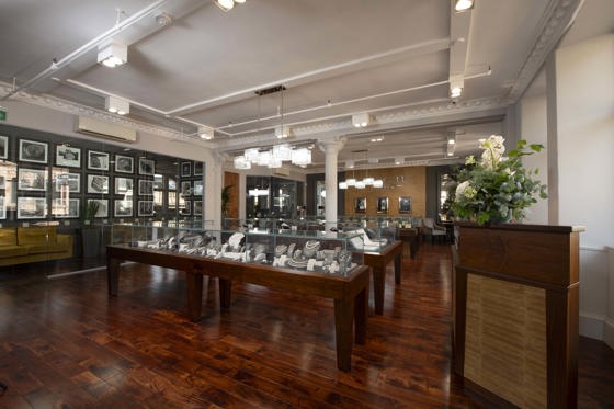 Tom Coll Jewellery showroom in Argyll Arcade, Glasgow, displaying an impressive selection of engagement rings, wedding bands, pre-owned Rolex watches, with an in-house workshop.